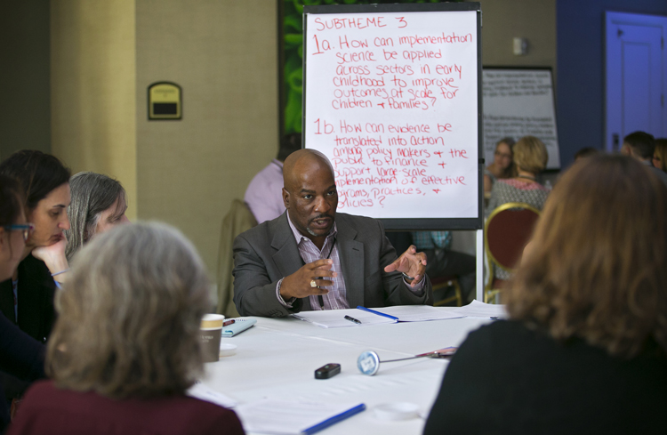 summit attendees in their workgroups