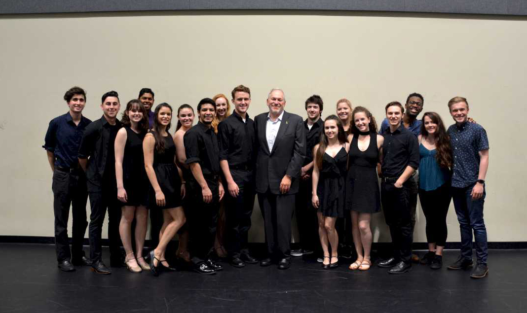 UF alum miles wilkin at UF with students