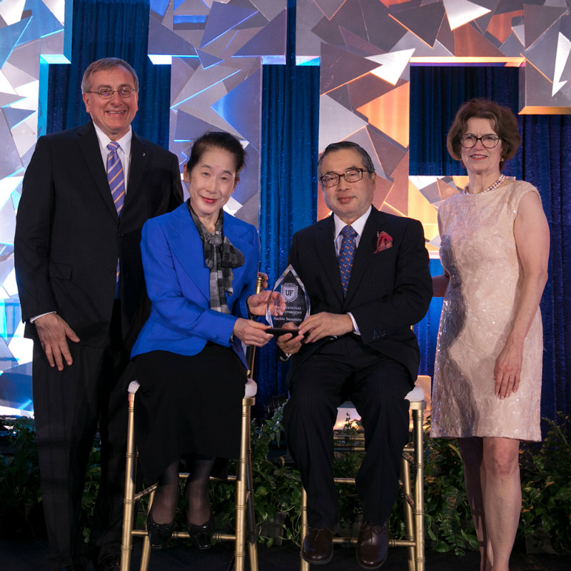 Photo of UF President Kent Fuchs, Frances Semmoto, Sachio Semmoto and Beth McCague