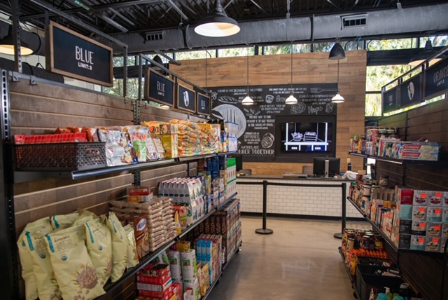 Dry goods sit on shelves in the expansion of UF's student food pantry.